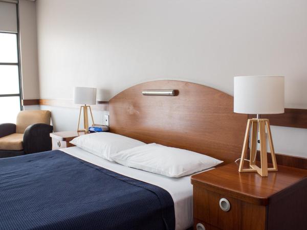 Highlander Hotel Bar Kitchen Rooftop : photo 4 de la chambre chambre supérieure lit queen-size