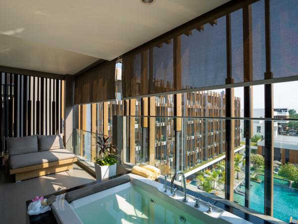 G Hua Hin Resort & Mall : photo 9 de la chambre suite familiale avec bain à remous