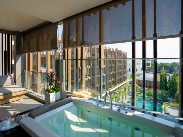 G Hua Hin Resort & Mall : photo 10 de la chambre suite familiale avec bain à remous