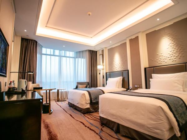 Wyndham Qingdao : photo 2 de la chambre deluxe city view room with twin bed