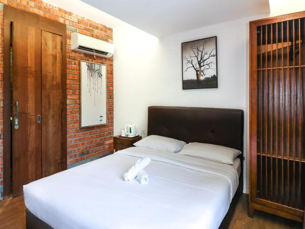 UrbanStay Industrial : photo 1 de la chambre chambre double deluxe