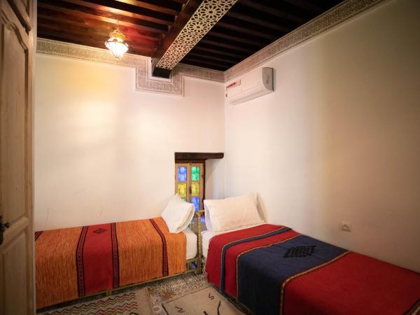Riad Mounana fez luxurious palace & spa : photo 1 de la chambre petite chambre lits jumeaux