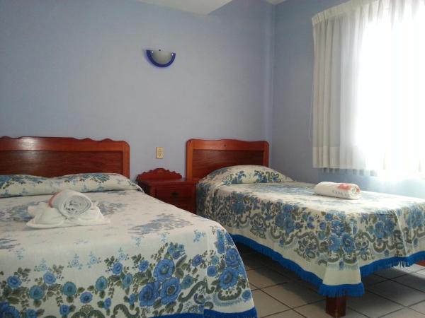 Hotel Casa Arnel : photo 2 de la chambre chambre triple