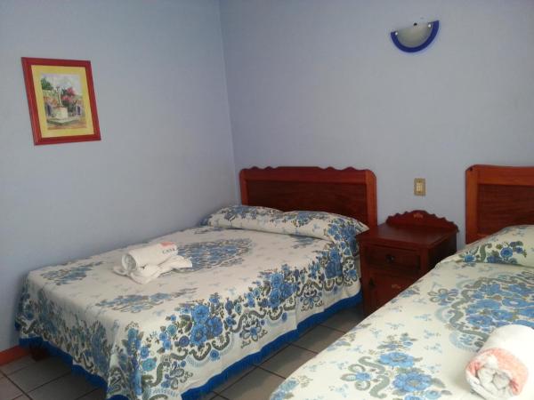 Hotel Casa Arnel : photo 3 de la chambre chambre triple