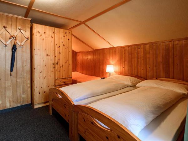 Jungfrau Lodge, Swiss Mountain Hotel : photo 10 de la chambre chambre quadruple avec salle de bains privative