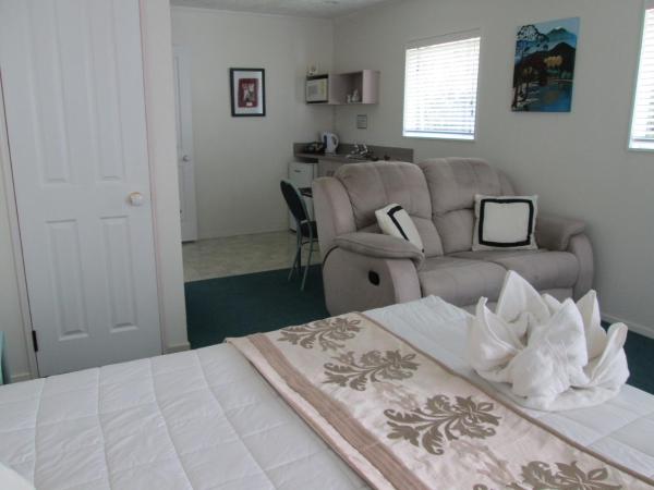 Palm Court Motor Inn : photo 8 de la chambre studio avec bain à remous