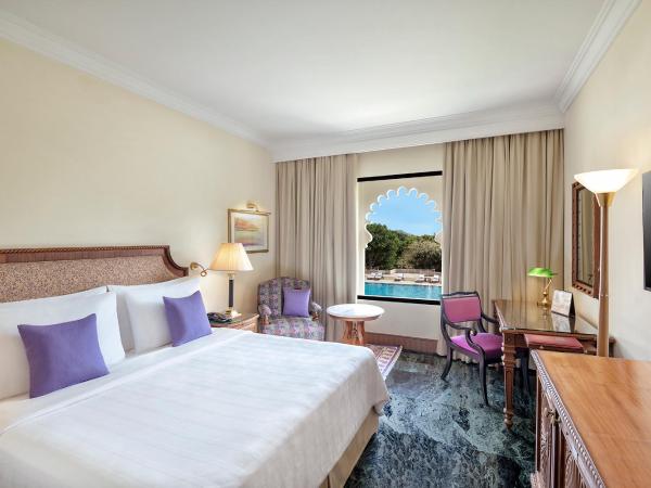 Trident Udaipur : photo 3 de la chambre chambre double deluxe - vue sur piscine