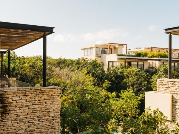 Copal Tulum Hotel : photo 5 de la chambre chambre double deluxe jungle avec terrasse et 1 lit king-size