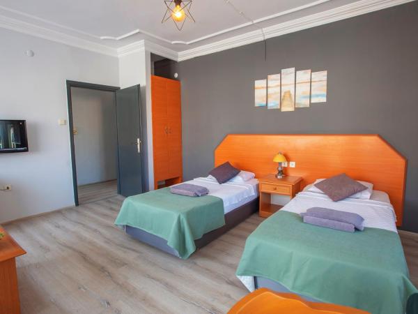 HMA Hotel & Suites : photo 1 de la chambre studio avec climatisation