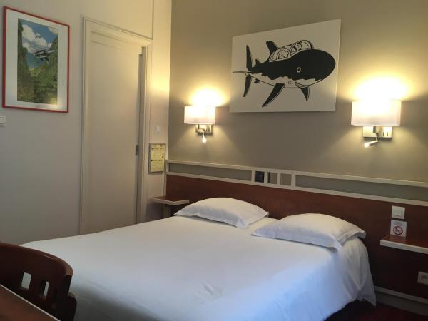 Logis Hôtel Restaurant LE MONARQUE : photo 1 de la chambre chambre double avec salle de bains privative