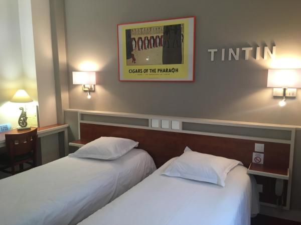 Logis Hôtel Restaurant LE MONARQUE : photo 1 de la chambre chambre lits jumeaux avec salle de bains privative