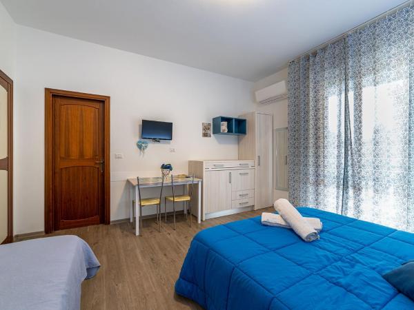 B&B Villa Montreux : photo 6 de la chambre chambre triple avec salle de bains privative