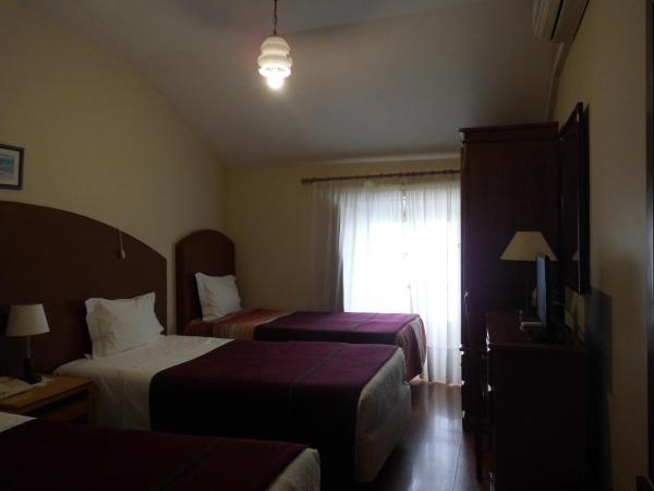 Hotel Larbelo : photo 1 de la chambre chambre triple Économique