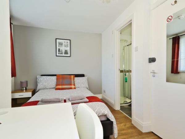 Harlinger Lodge : photo 2 de la chambre chambre double avec salle de bains privative