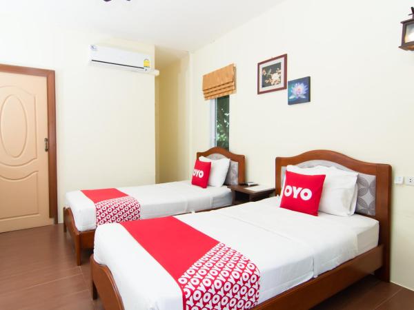 OYO 607 Nawang Resort : photo 10 de la chambre chambre lits jumeaux supérieure