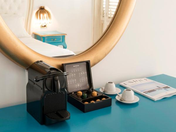 Mitsis Selection Laguna : photo 3 de la chambre hébergement lits jumeaux - vue sur terres