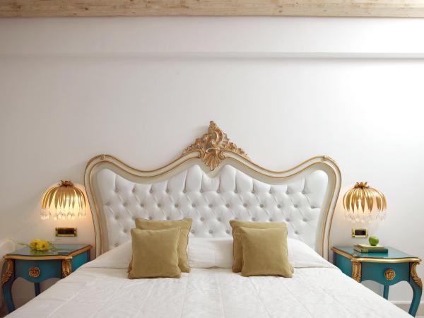 Mitsis Selection Laguna : photo 1 de la chambre hébergement lits jumeaux - vue sur terres