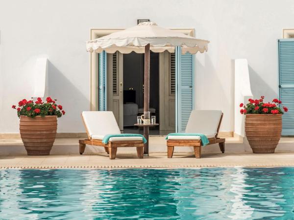 Mitsis Selection Laguna : photo 4 de la chambre bungalow familial avec piscine commune