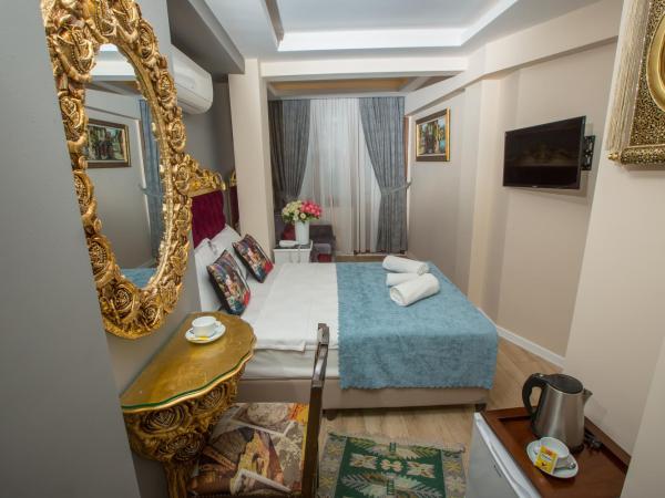 Atlantis Royal Hotel : photo 3 de la chambre chambre quadruple standard