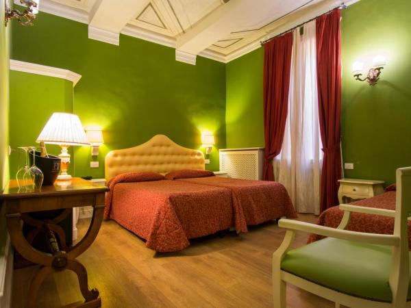 Hotel Pedrini : photo 1 de la chambre chambre triple