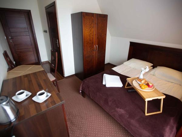 Willa Na Szczycie : photo 1 de la chambre chambre lit king-size avec balcon