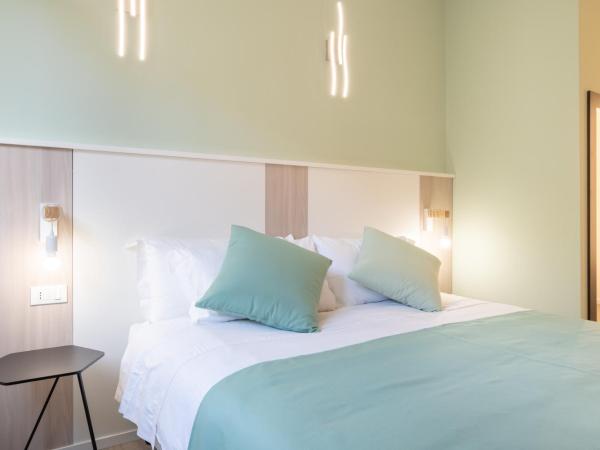 Torri & Portici : photo 9 de la chambre chambre deluxe double ou lits jumeaux