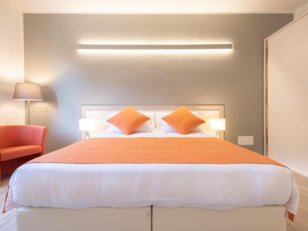 Torri & Portici : photo 2 de la chambre chambre double ou lits jumeaux deluxe supérieure