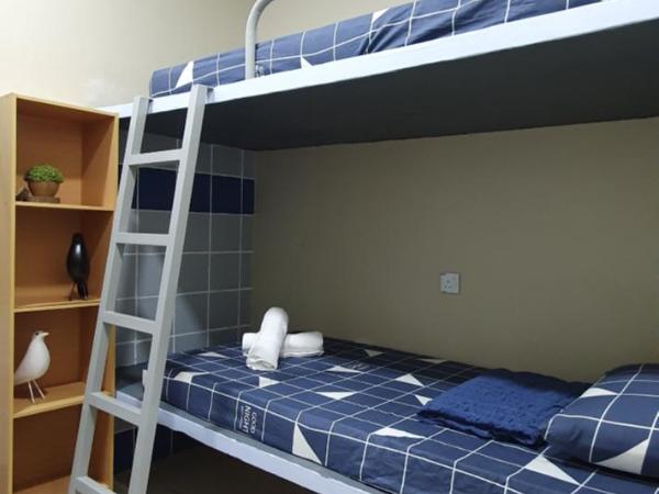 Thian Siong Inn : photo 1 de la chambre chambre quadruple Économique avec salle de bains commune