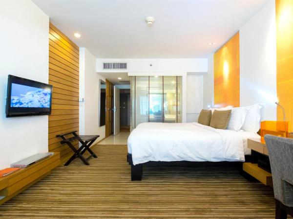 dusitD2 Chiang Mai : photo 2 de la chambre hébergement lit king-size de luxe - club