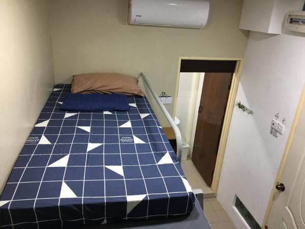 Thian Siong Inn : photo 4 de la chambre chambre quadruple avec salle de bains privative