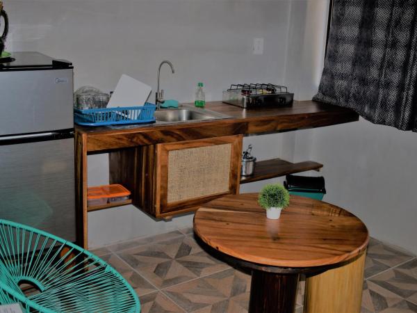 Coccoloba Guest House : photo 7 de la chambre suite - vue sur piscine 