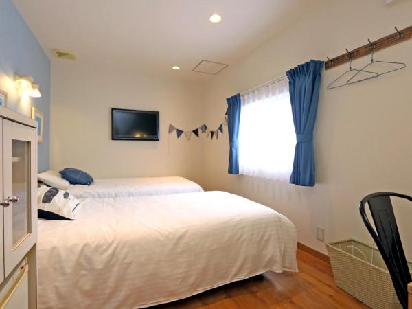 Hotel 3 O'Clock Tennoji : photo 6 de la chambre chambre lits jumeaux avec salle de bains privative