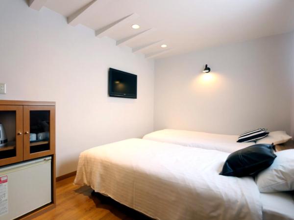 Hotel 3 O'Clock Tennoji : photo 8 de la chambre chambre lits jumeaux avec salle de bains privative