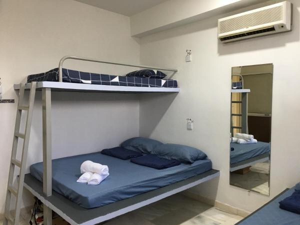 Thian Siong Inn : photo 4 de la chambre chambre familiale avec salle de bains commune