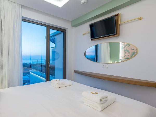 Onira Suite Dreams : photo 2 de la chambre villa happiness 2 chambres avec bain à remous - vue sur mer