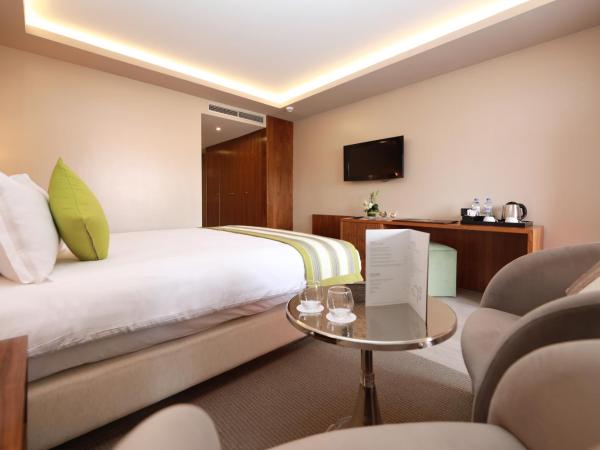 Kenzi Rose Garden : photo 1 de la chambre chambre simple supérieure - vue sur jardin