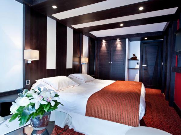 Hôtel Les Sherpas : photo 2 de la chambre suite familiale deluxe