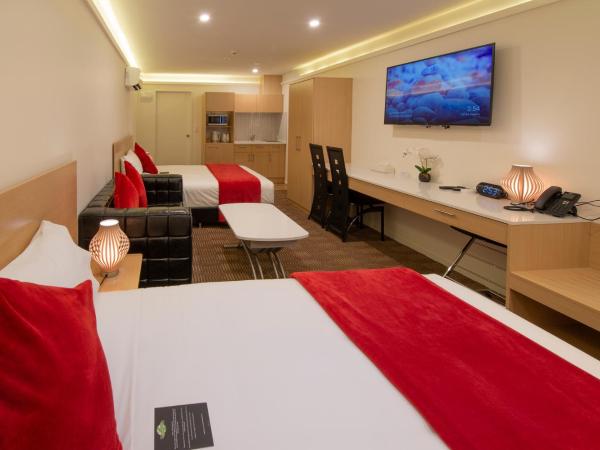 V Motel : photo 1 de la chambre large two queen bed studio