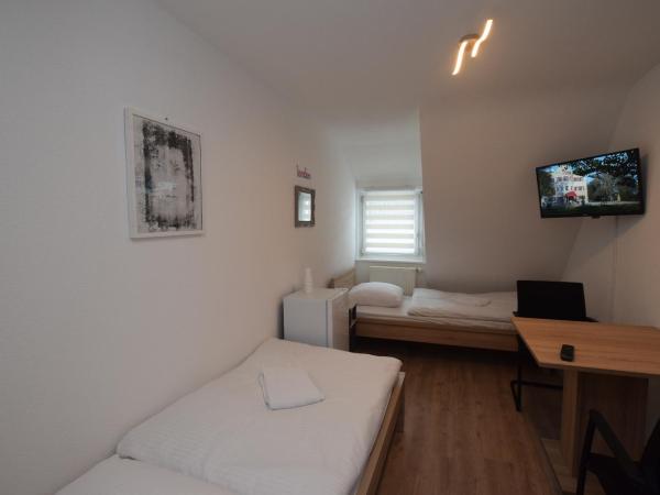 AB Möhringen Messe Zimmer : photo 1 de la chambre chambre lits jumeaux avec salle de bains commune