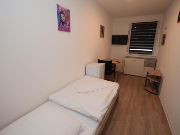 AB Möhringen Messe Zimmer : photo 1 de la chambre chambre simple avec salle de bains commune