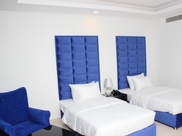 Parkside Plaza Muscat : photo 9 de la chambre chambre lits jumeaux standard