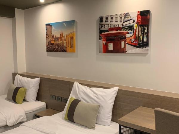 Toptel Thaphra - ท็อปเทล ท่าพระ : photo 10 de la chambre chambre lits jumeaux supérieure