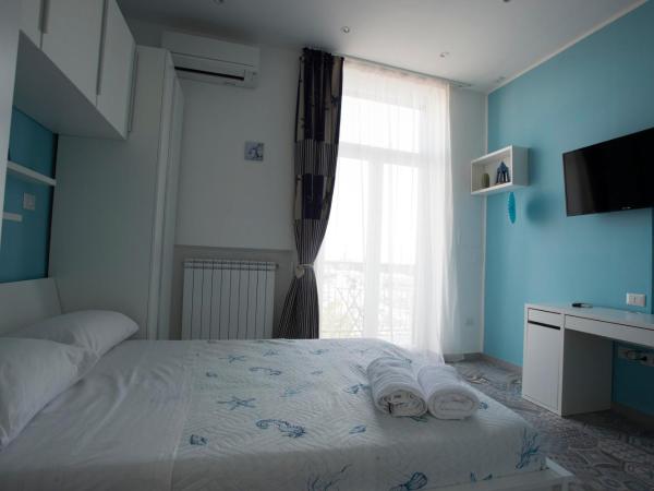 Nereidi Suites : photo 2 de la chambre chambre double deluxe avec balcon - vue sur mer
