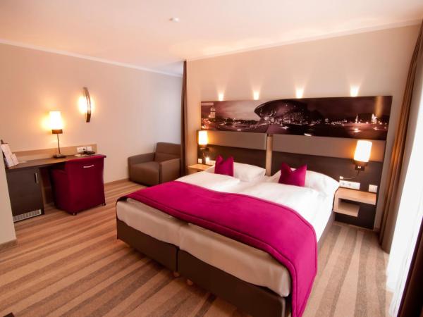 Amalienburg - Boutique & Boarding Hotel : photo 1 de la chambre chambre triple deluxe
