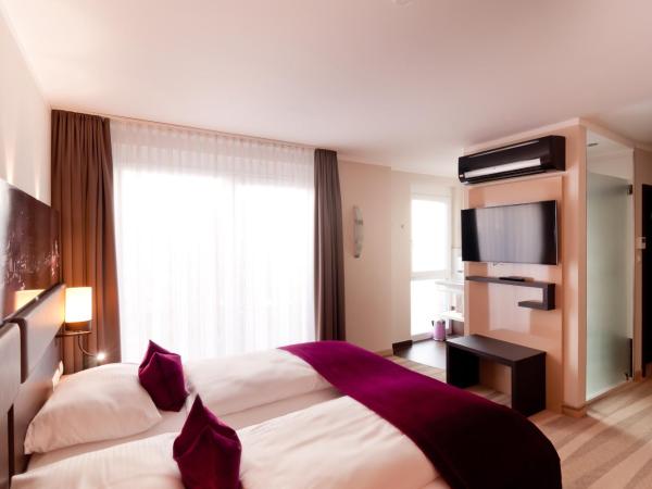 Amalienburg - Boutique & Boarding Hotel : photo 5 de la chambre chambre triple deluxe