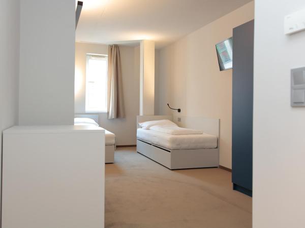 Maverick Urban Lodge : photo 6 de la chambre chambre lits jumeaux standard