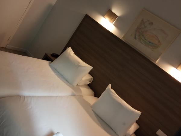 Hotel du Globe 18 : photo 2 de la chambre chambre lits jumeaux