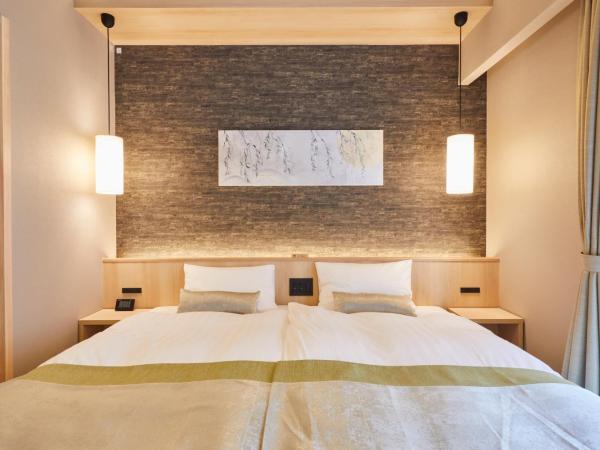 Rinn Shirakawa South : photo 1 de la chambre chambre lits jumeaux deluxe