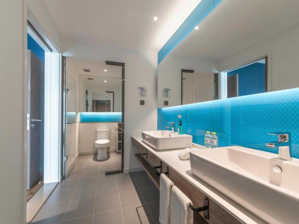 Holiday Inn Express Qingdao Chengyang Central, an IHG Hotel : photo 1 de la chambre suite 1 chambre