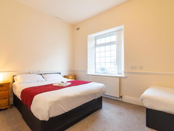 Old Trafford Stadium Hotel : photo 9 de la chambre chambre triple deluxe avec salle de bains privative